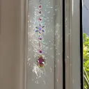 Colgante Atrapasol - Estrella con Flor redonda (TORNASOL)